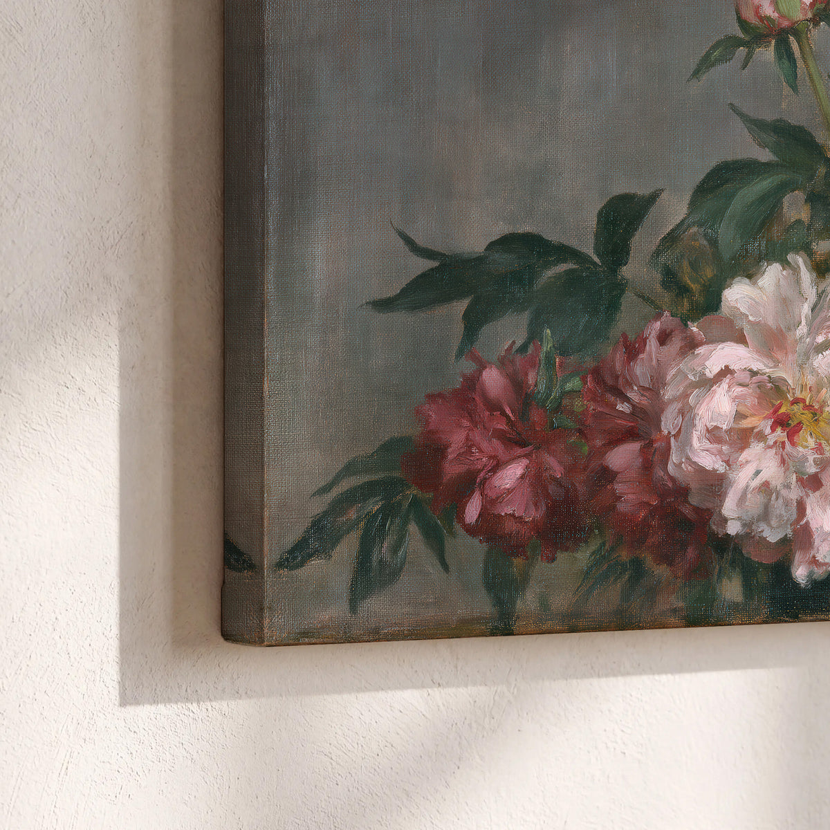 Cream and dusty pink peonies arranged against a muted gray-green background 3 piece canvas wall art material and edge close up