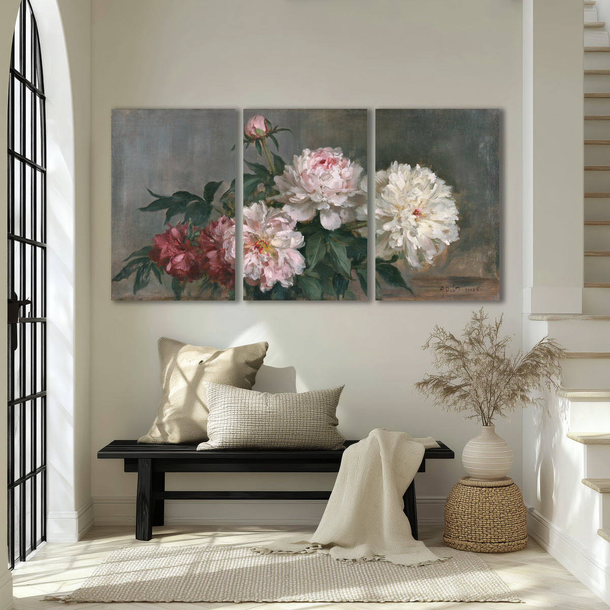 Cream and dusty pink peonies arranged against a muted gray-green background 3 piece canvas wall art displayed in a entryway