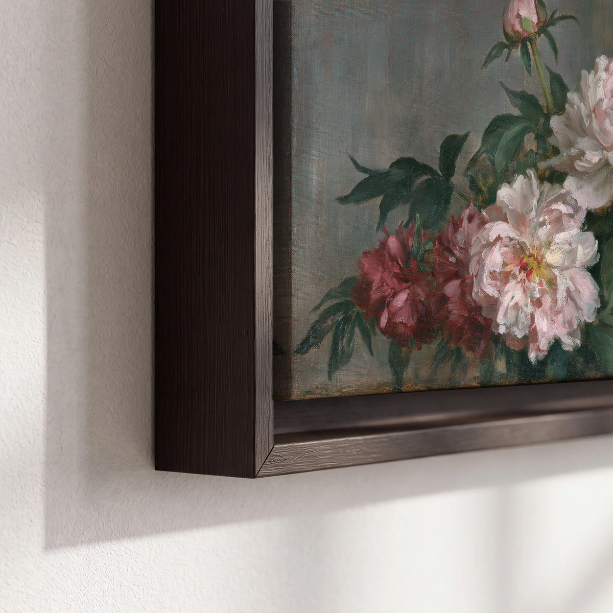 Cream and dusty pink peonies arranged against a muted gray-green background 3 piece framed canvas wall art material and edge close up