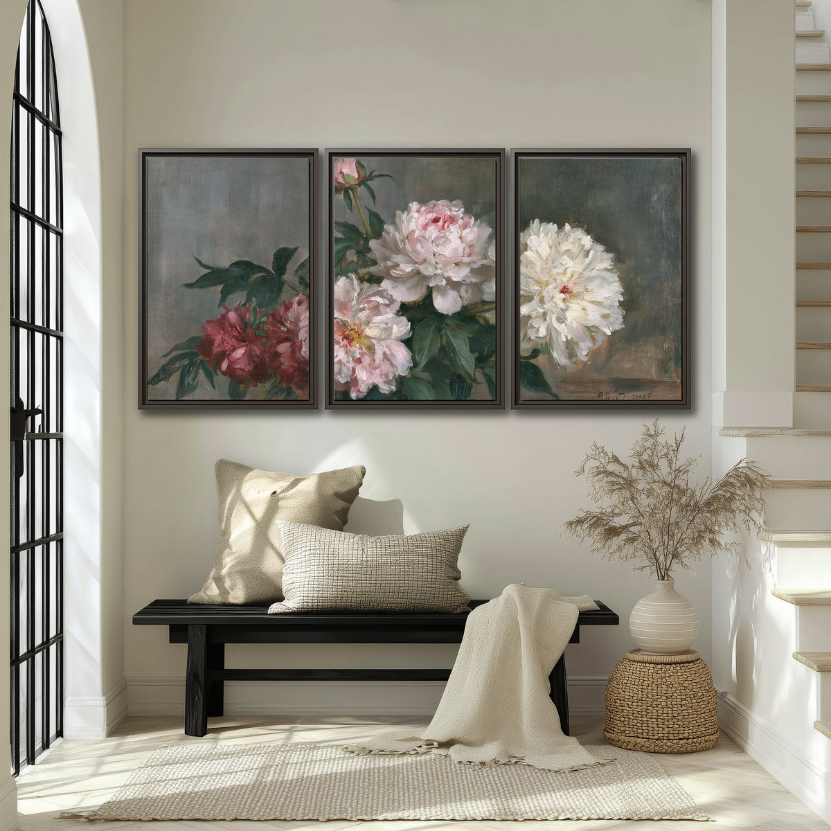Cream and dusty pink peonies arranged against a muted gray-green background 3 piece framed canvas wall art displayed in a entryway