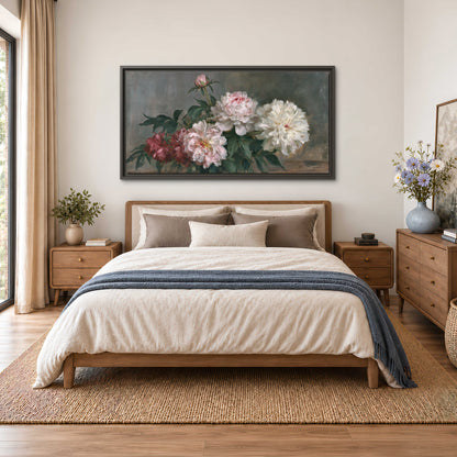 Cream and dusty pink peonies arranged against a muted gray-green background single framed canvas wall art styled in an interior