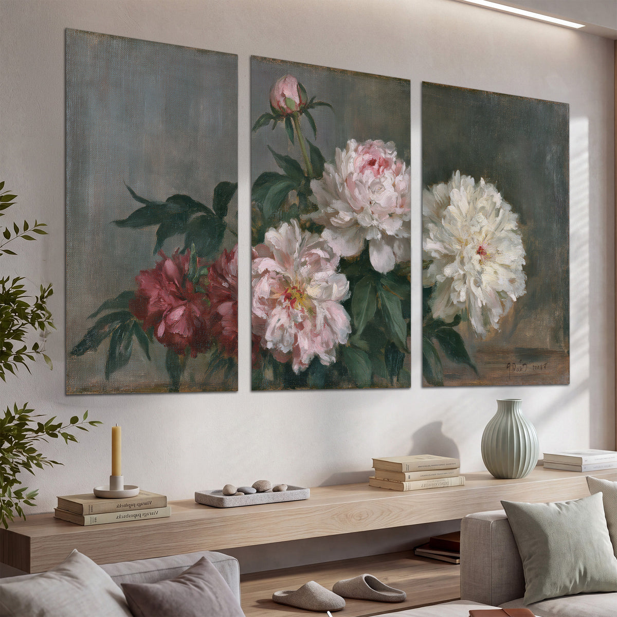 Cream and dusty pink peonies arranged against a muted gray-green background set of 3 poster prints displayed in a console