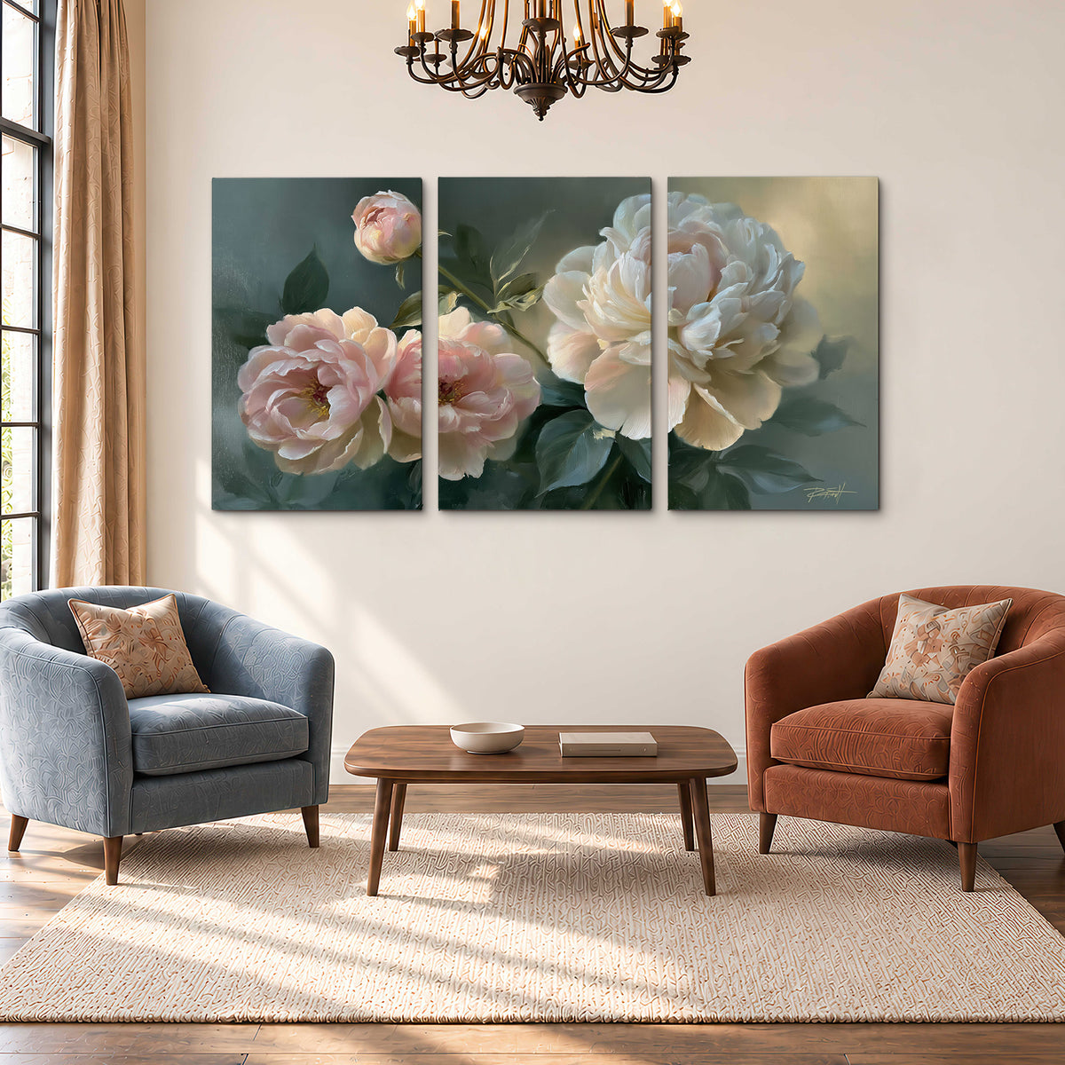 A large cream peony beside blush flowers and broad green leaves 3 piece canvas wall art styled in an interior