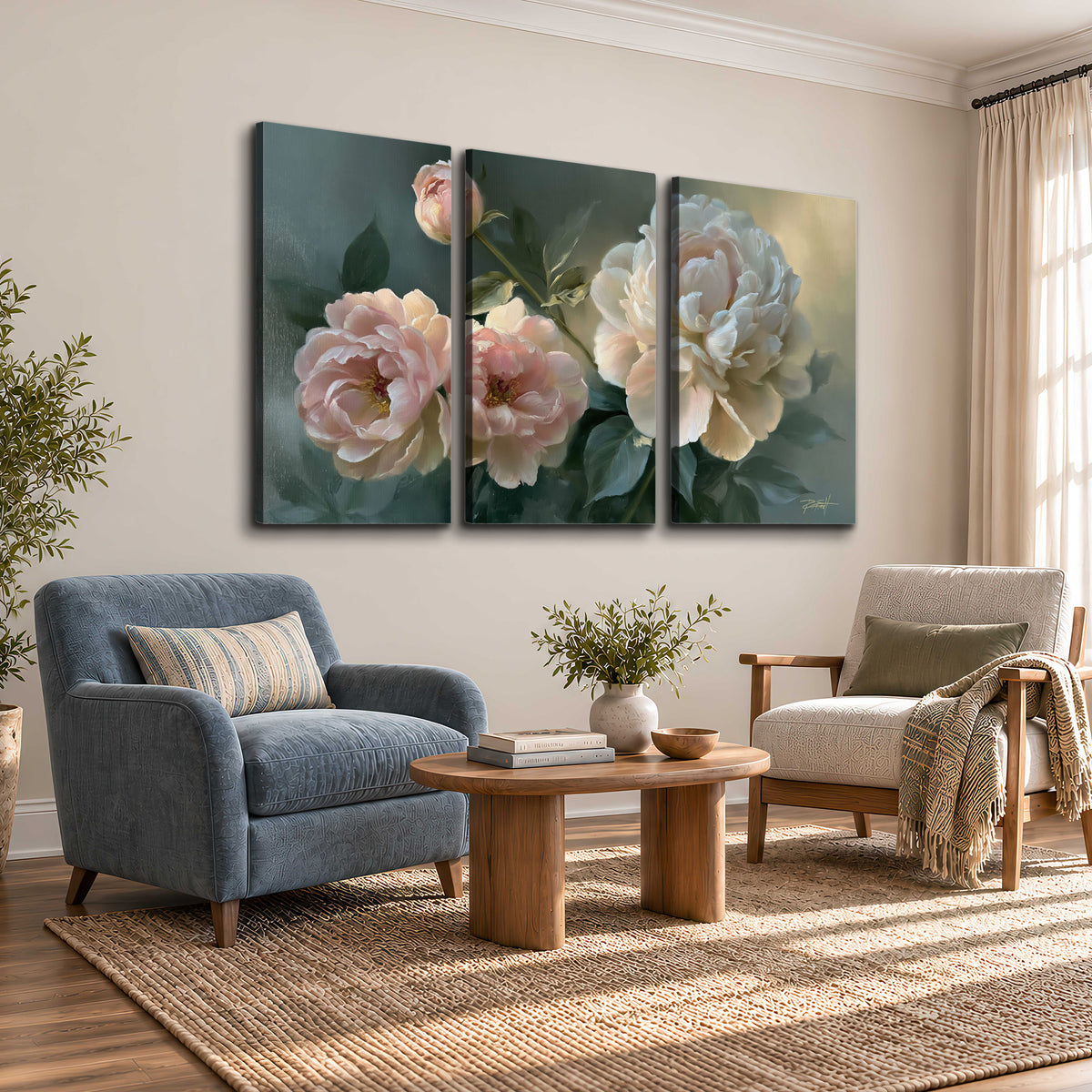 A large cream peony beside blush flowers and broad green leaves 3 piece canvas wall art styled in an interior