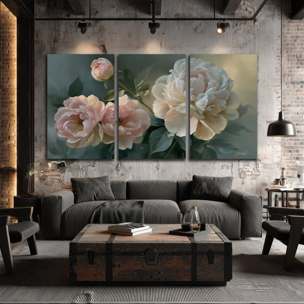 A large cream peony beside blush flowers and broad green leaves 3 piece canvas wall art displayed in a industrial room