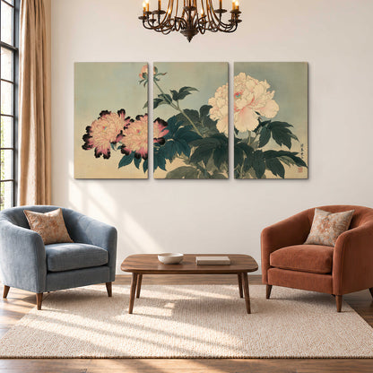 Pink and cream peonies with dark green leaves on a warm beige ground 3 piece canvas wall art styled in an interior