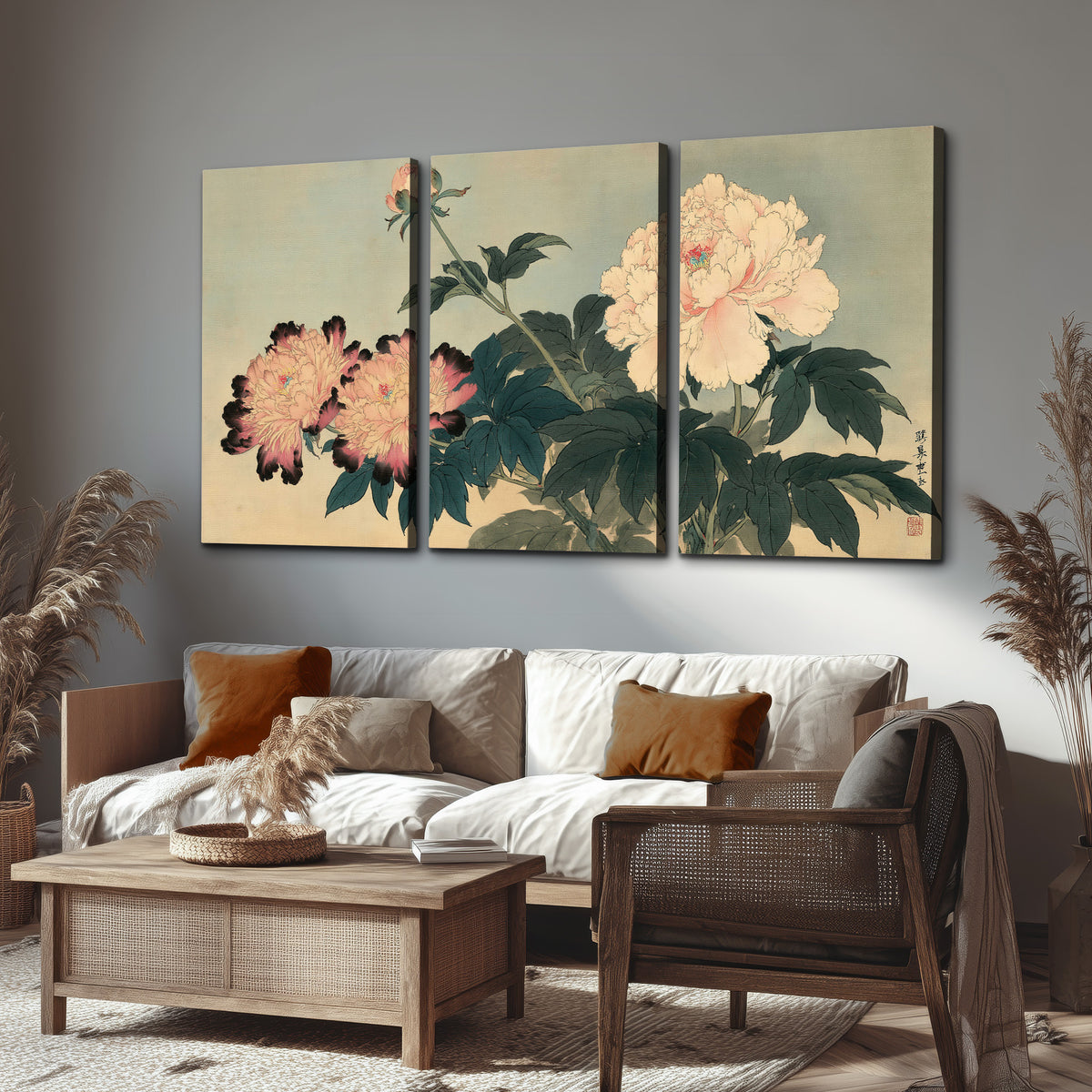 Pink and cream peonies with dark green leaves on a warm beige ground 3 piece canvas wall art displayed in a rustic living room