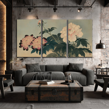 Pink and cream peonies with dark green leaves on a warm beige ground 3 piece canvas wall art displayed in a industrial room