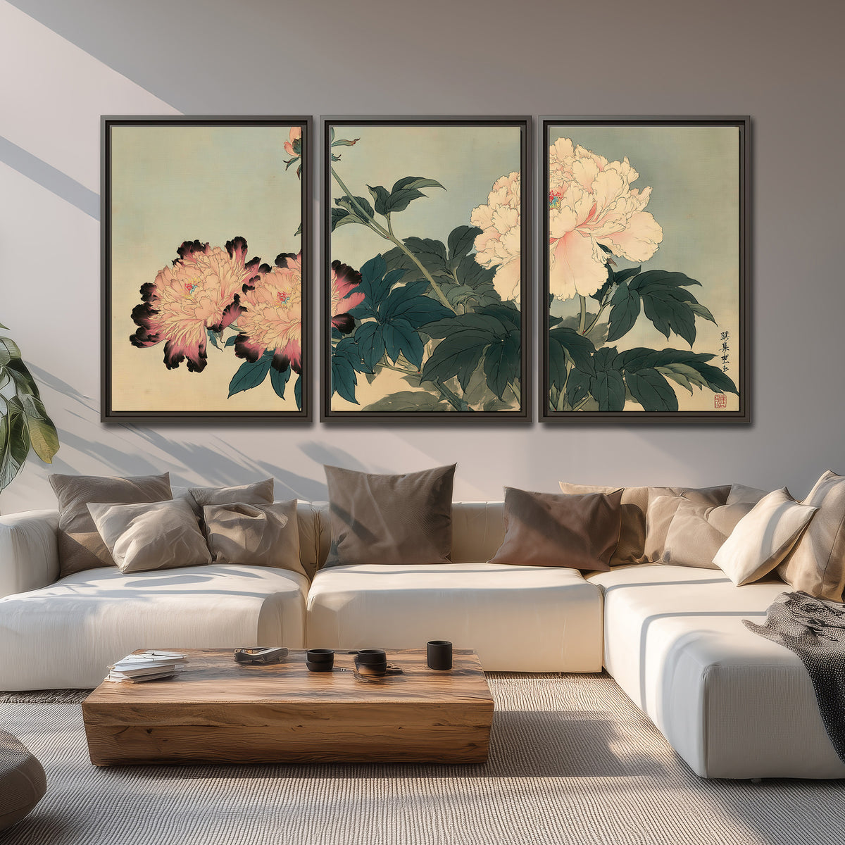 Pink and cream peonies with dark green leaves on a warm beige ground 3 piece framed canvas wall art displayed in a living room