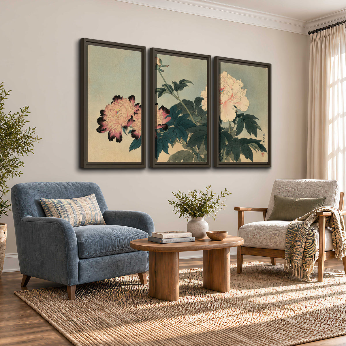 Pink and cream peonies with dark green leaves on a warm beige ground 3 piece framed canvas wall art styled in an interior