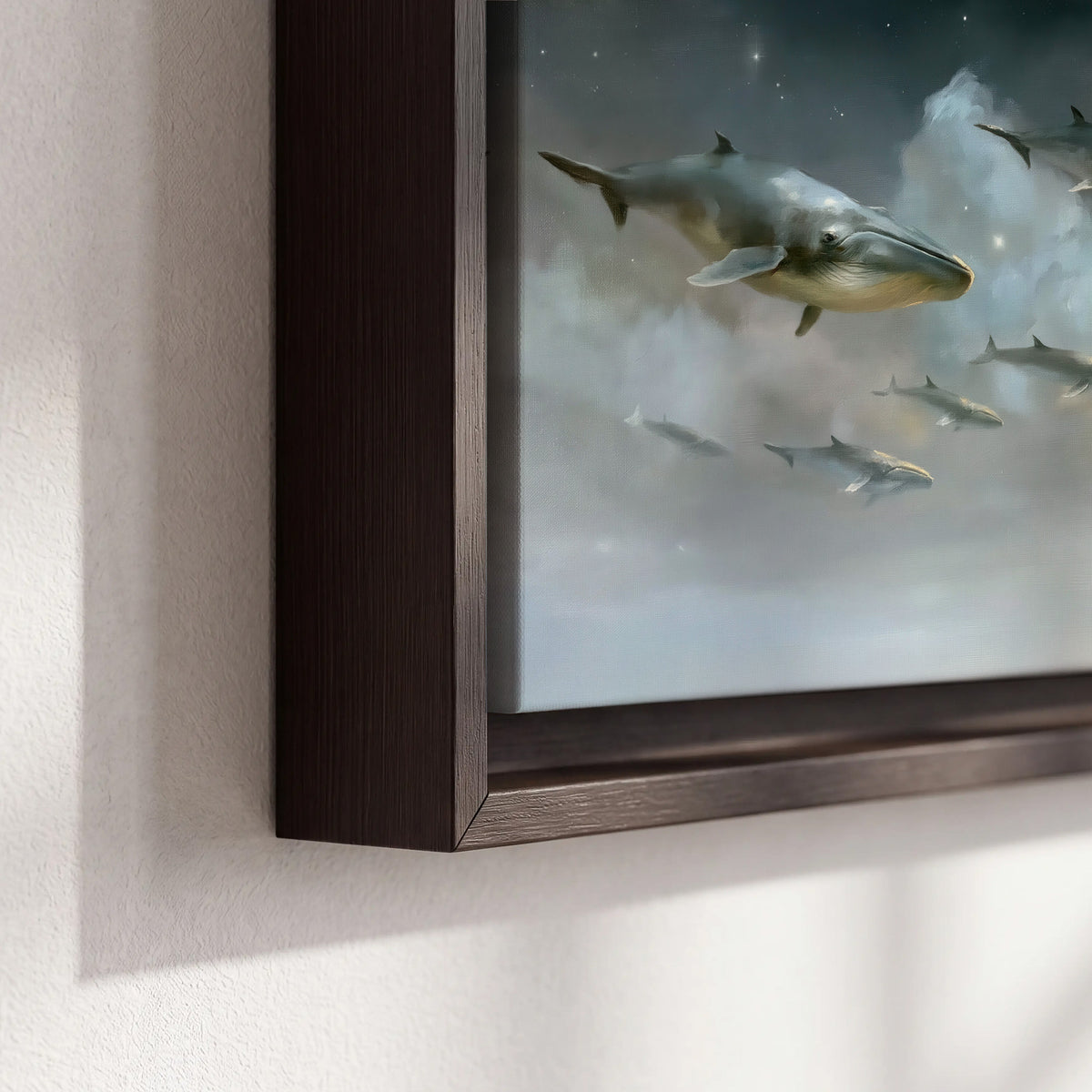Whales drifting through pale dreamlike clouds toward a golden moon 3 piece framed canvas wall art material and edge close up