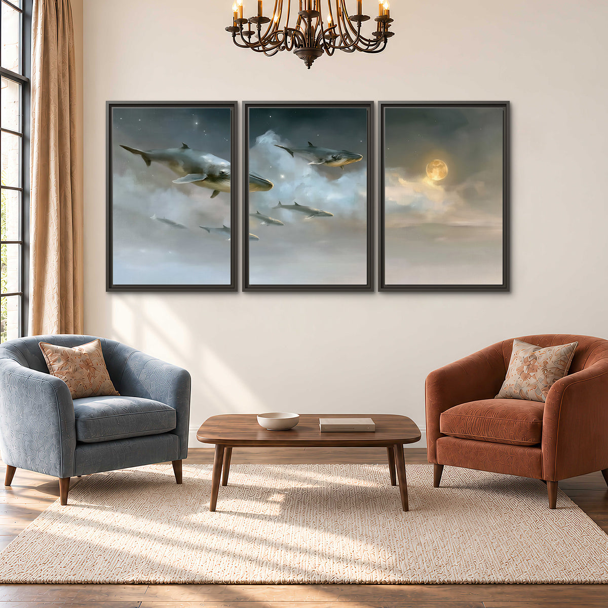 Whales drifting through pale dreamlike clouds toward a golden moon 3 piece framed canvas wall art styled in an interior