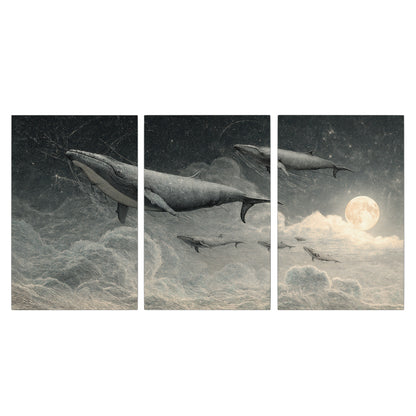 Monochrome whales floating over misty clouds beside a luminous painted moon 3 piece canvas wall art viewed straight on