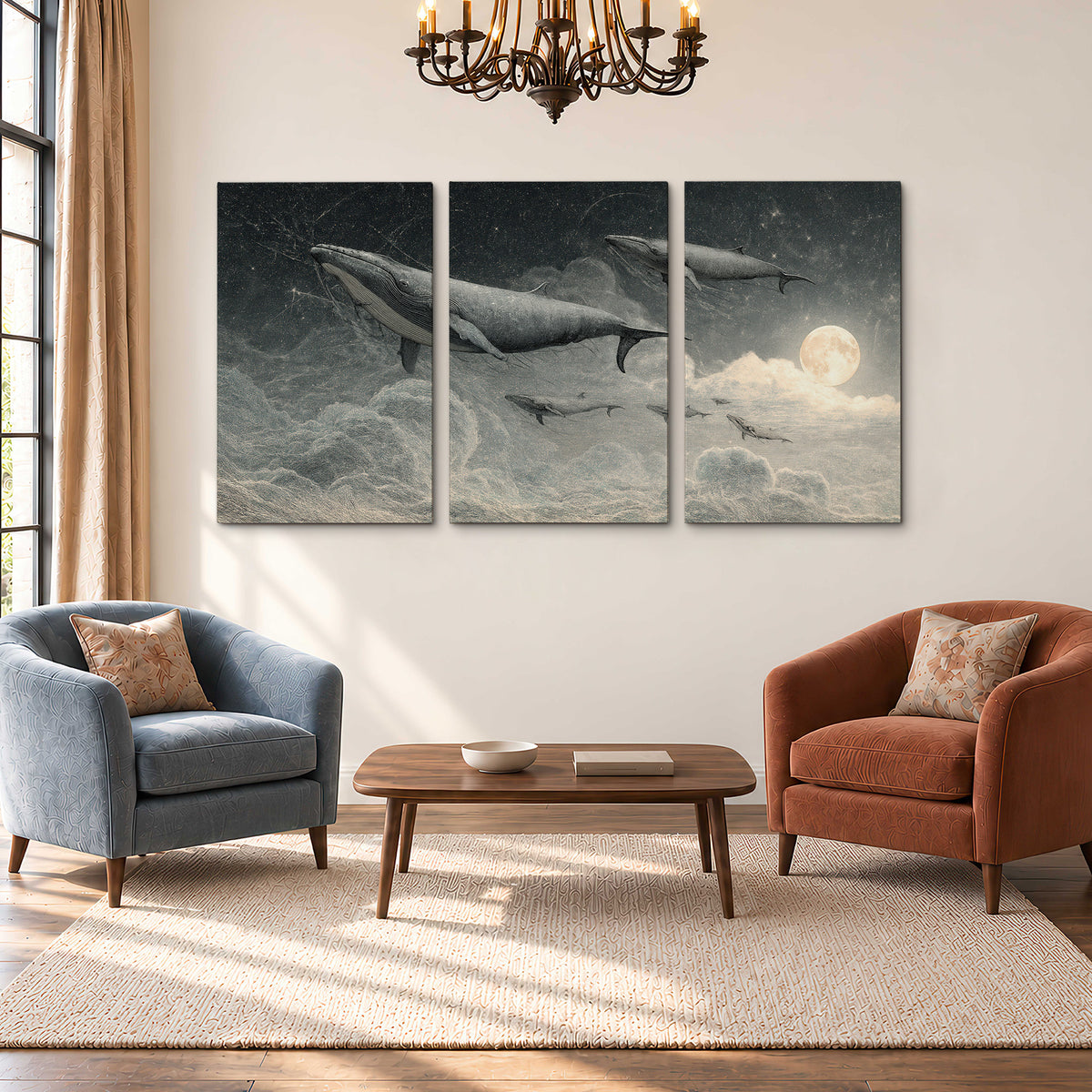 Monochrome whales floating over misty clouds beside a luminous painted moon 3 piece canvas wall art styled in an interior