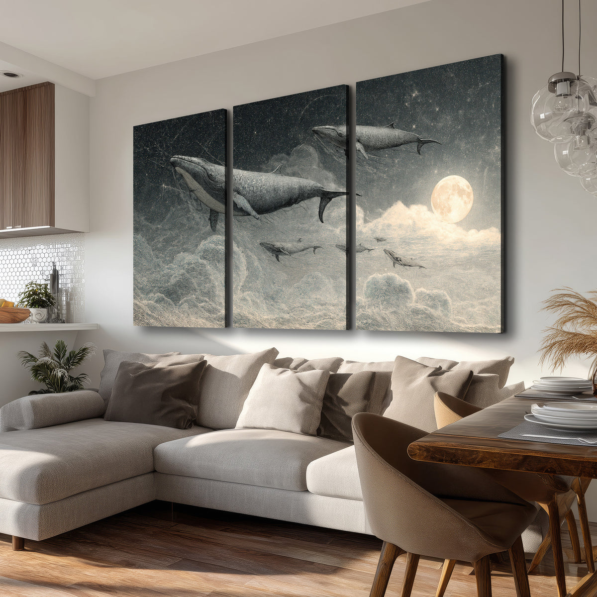 Monochrome whales floating over misty clouds beside a luminous painted moon 3 piece canvas wall art room and product view