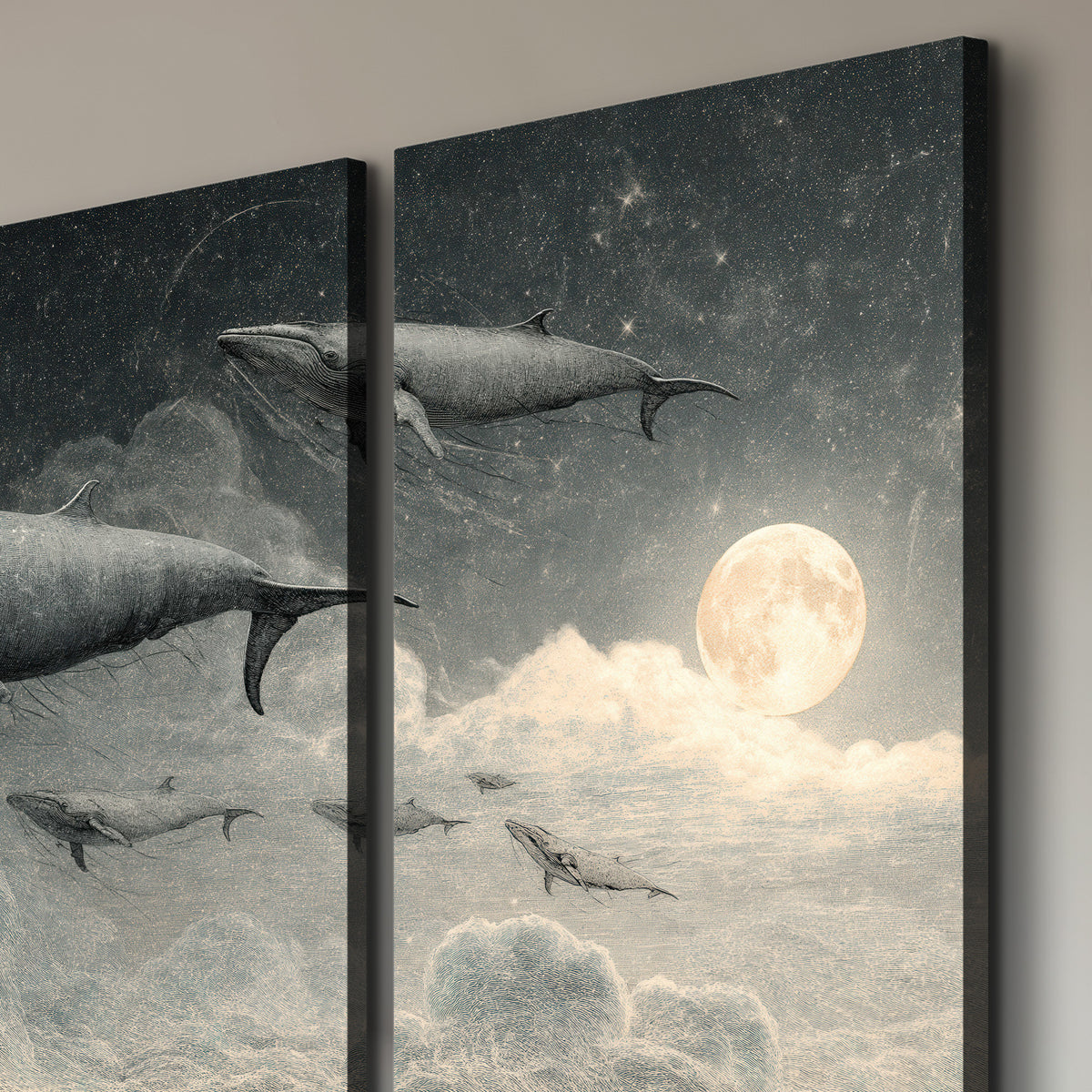 Monochrome whales floating over misty clouds beside a luminous painted moon 3 piece canvas wall art room and product view