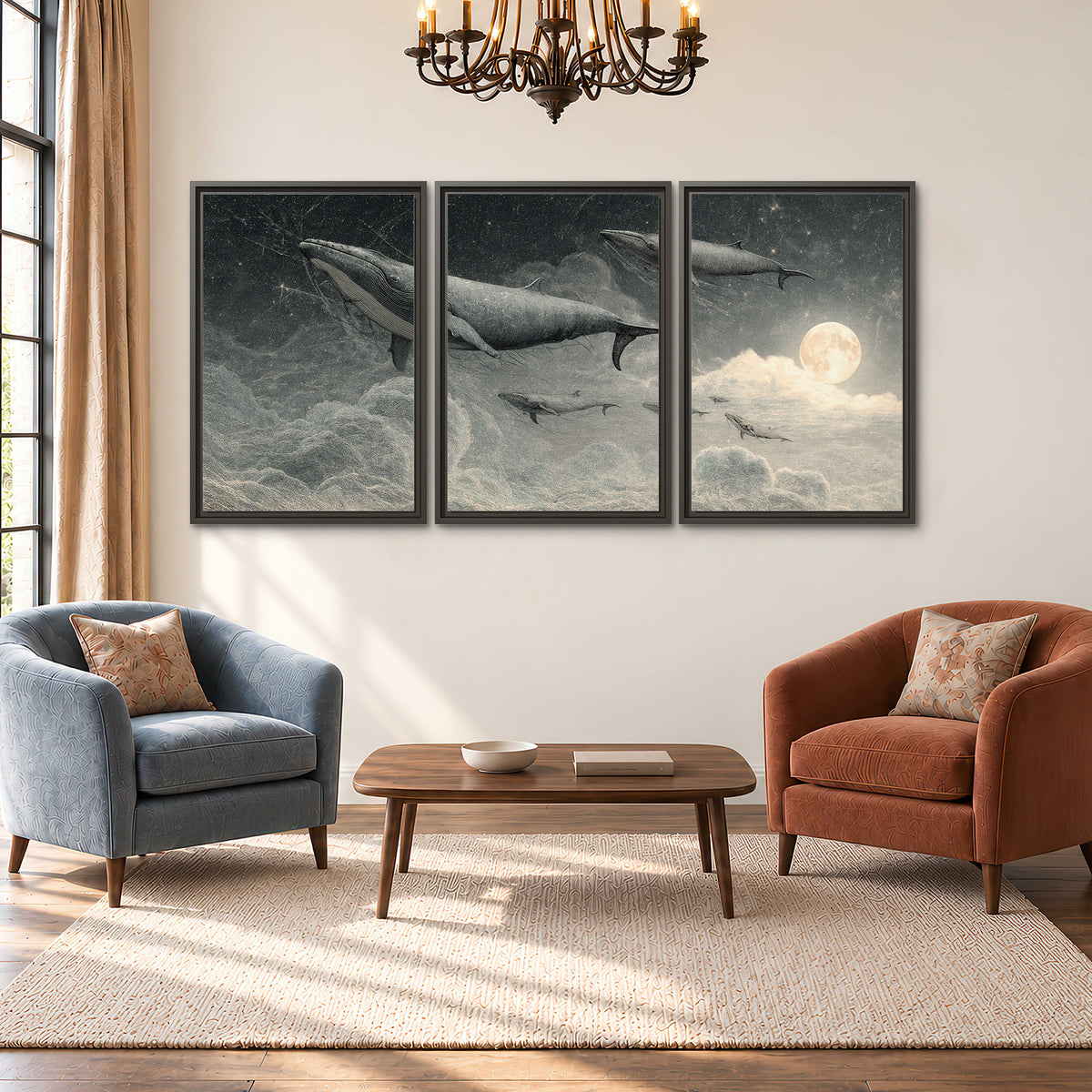 Monochrome whales floating over misty clouds beside a luminous painted moon 3 piece framed canvas wall art styled in an interior