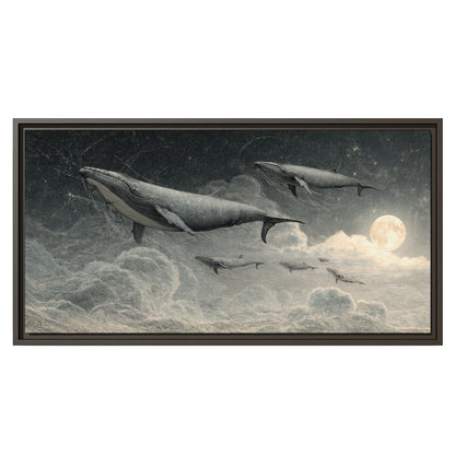 Monochrome whales floating over misty clouds beside a luminous painted moon single framed canvas wall art viewed straight on