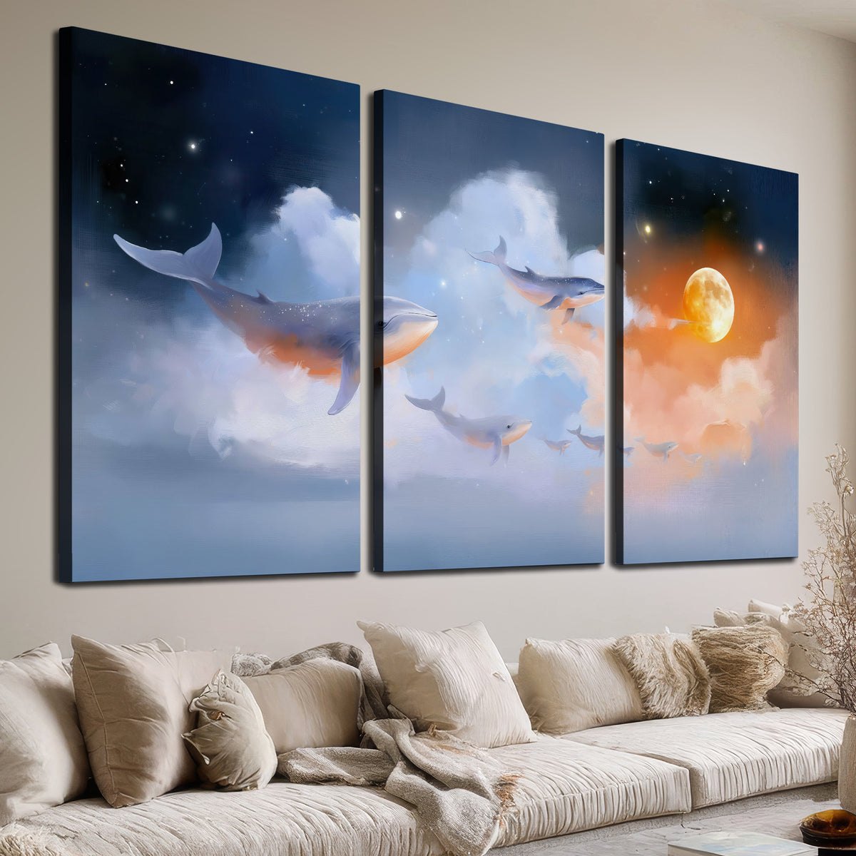 Blue whales gliding through pastel clouds beneath stars and a warm orange moon 3 piece canvas wall art room and product view