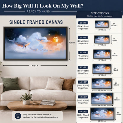 Blue whales gliding through pastel clouds beneath stars and a warm orange moon single framed canvas wall art size guide above a sofa; room view is illustrative