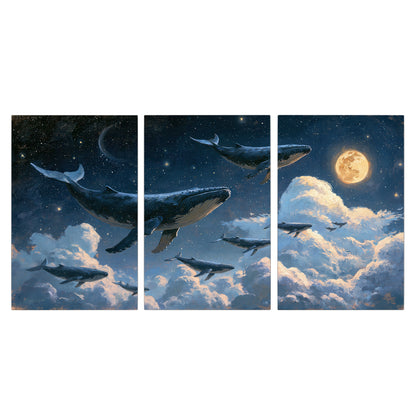 A group of whales floating among clouds beneath a golden moon in a deep blue night sky 3 piece canvas wall art viewed straight on