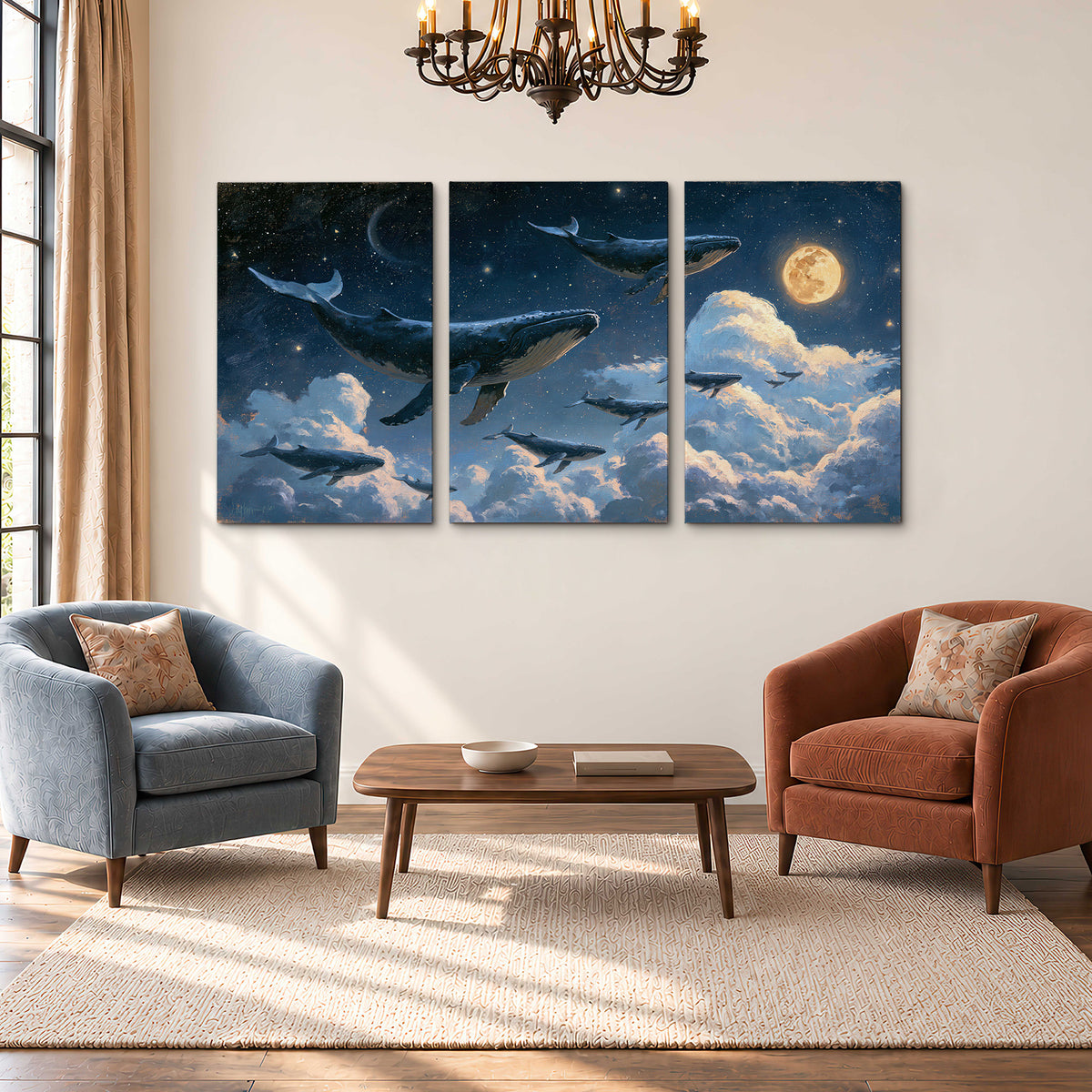 A group of whales floating among clouds beneath a golden moon in a deep blue night sky 3 piece canvas wall art styled in an interior