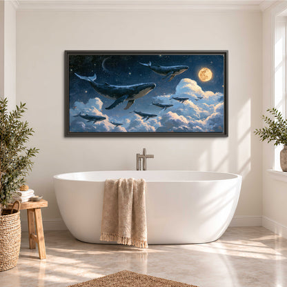 A group of whales floating among clouds beneath a golden moon in a deep blue night sky single framed canvas wall art styled in an interior