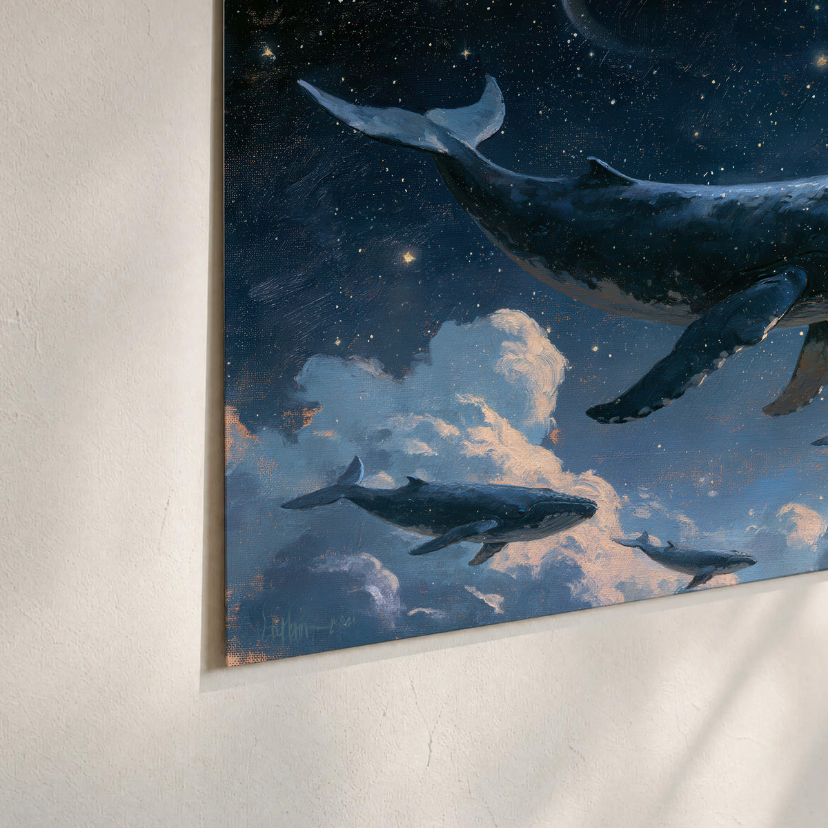 A group of whales floating among clouds beneath a golden moon in a deep blue night sky set of 3 poster prints material and edge close up