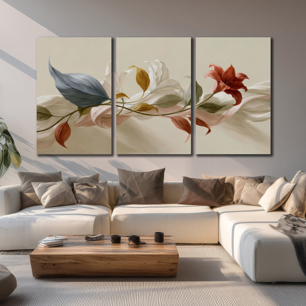 Ivory calla-like flowers and muted red accents curling across a cream background 3 piece canvas wall art displayed in a living room