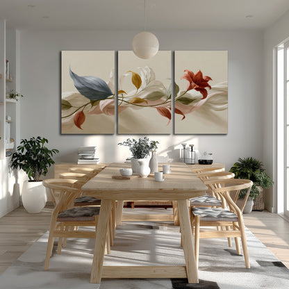 Ivory calla-like flowers and muted red accents curling across a cream background 3 piece canvas wall art room and product view