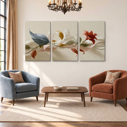 Ivory calla-like flowers and muted red accents curling across a cream background 3 piece canvas wall art styled in an interior