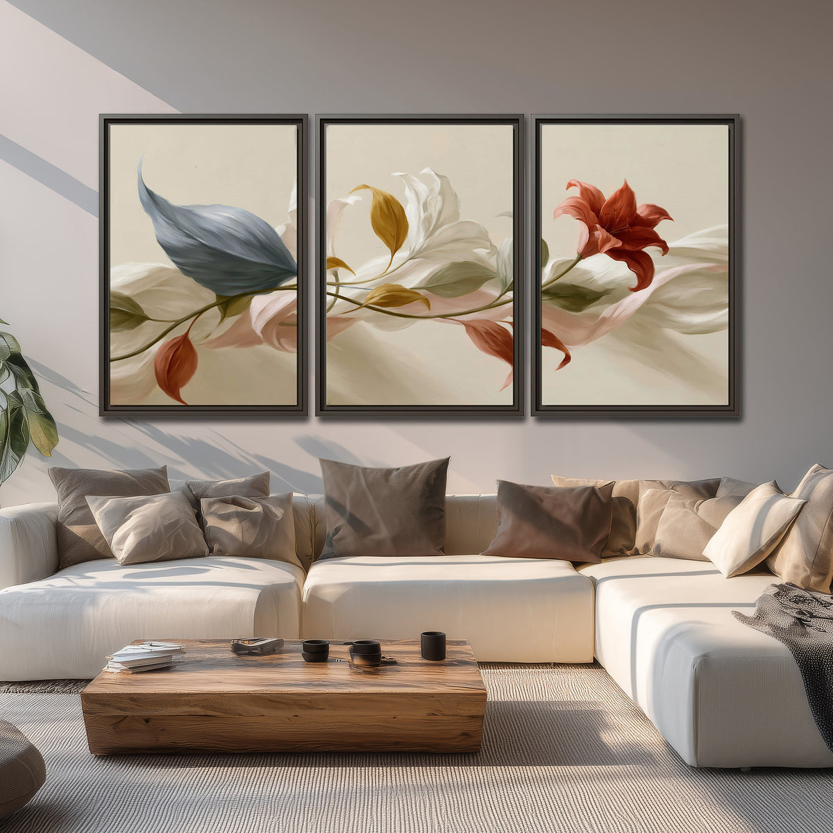 Ivory calla-like flowers and muted red accents curling across a cream background 3 piece framed canvas wall art displayed in a living room