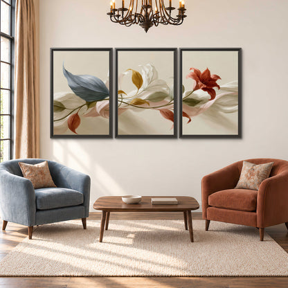 Ivory calla-like flowers and muted red accents curling across a cream background 3 piece framed canvas wall art styled in an interior