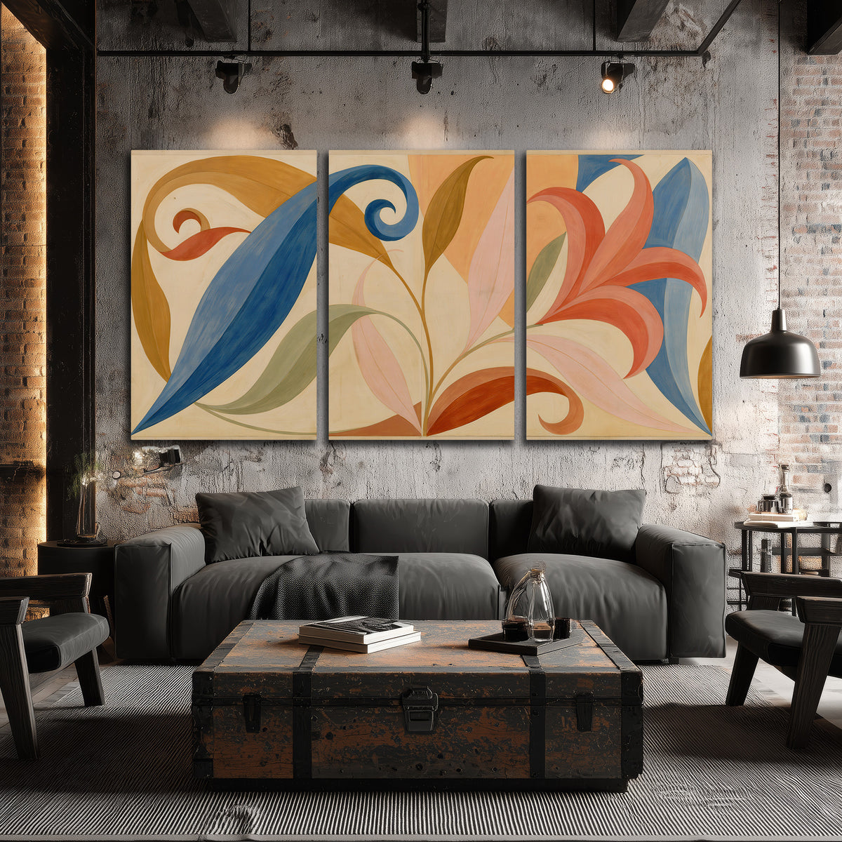 Bold blue, coral and golden leaf-like shapes flowing across a cream ground 3 piece canvas wall art displayed in a industrial room