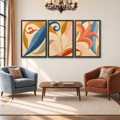 Bold blue, coral and golden leaf-like shapes flowing across a cream ground 3 piece framed canvas wall art styled in an interior