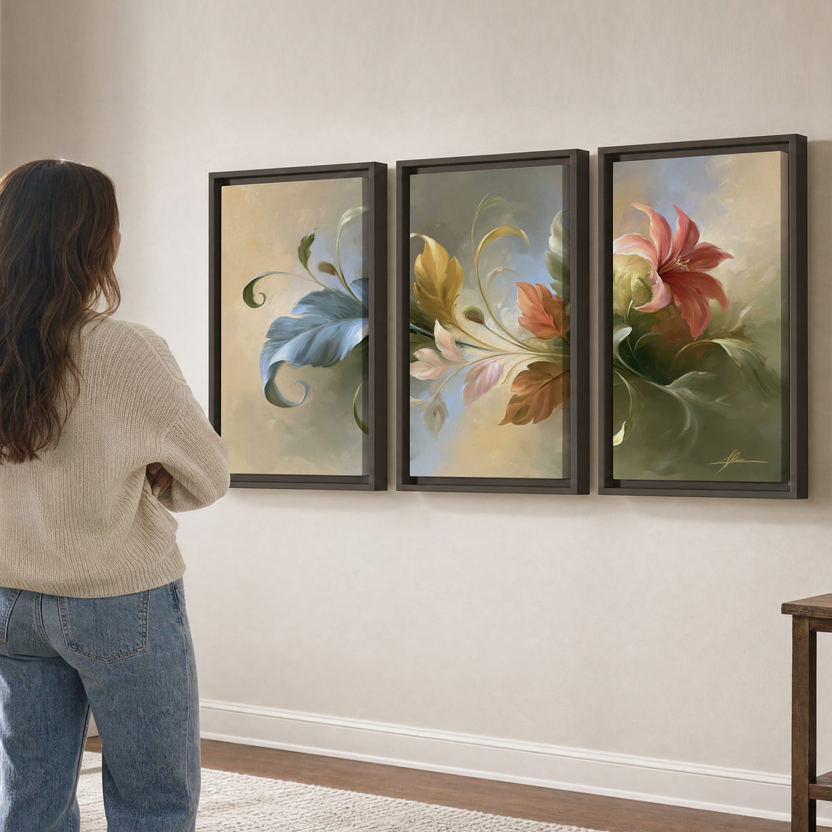 Curving blue, cream and warm red lily-like flowers on a softly shaded background 3 piece framed canvas wall art three panel arrangement on a wall