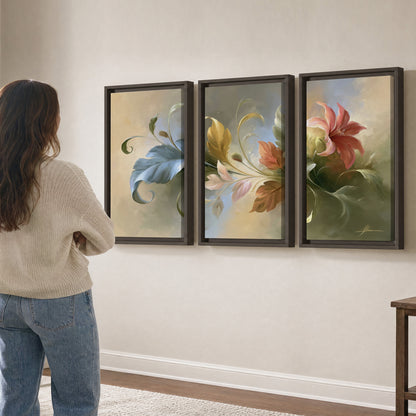Curving blue, cream and warm red lily-like flowers on a softly shaded background 3 piece framed canvas wall art three panel arrangement on a wall