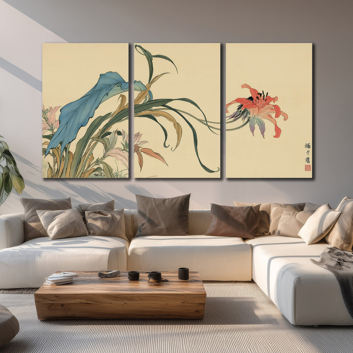 A delicate red flower and long blue-green leaves on a warm cream ground 3 piece canvas wall art displayed in a living room
