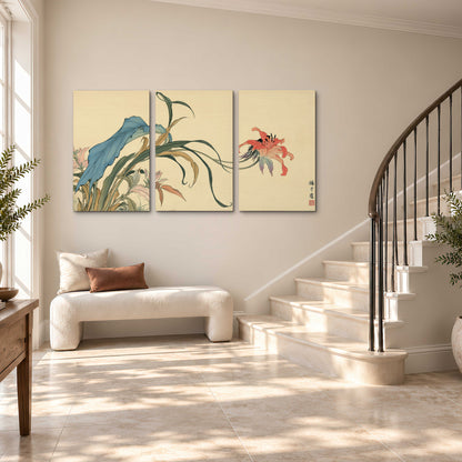A delicate red flower and long blue-green leaves on a warm cream ground 3 piece canvas wall art styled in an interior