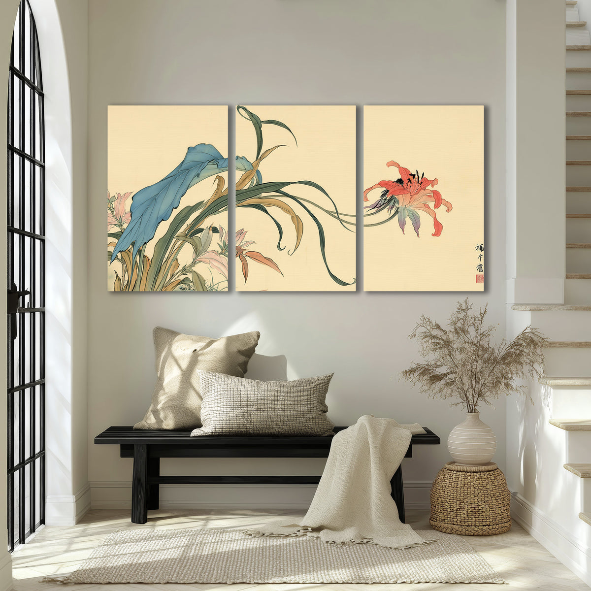 A delicate red flower and long blue-green leaves on a warm cream ground 3 piece canvas wall art displayed in a entryway