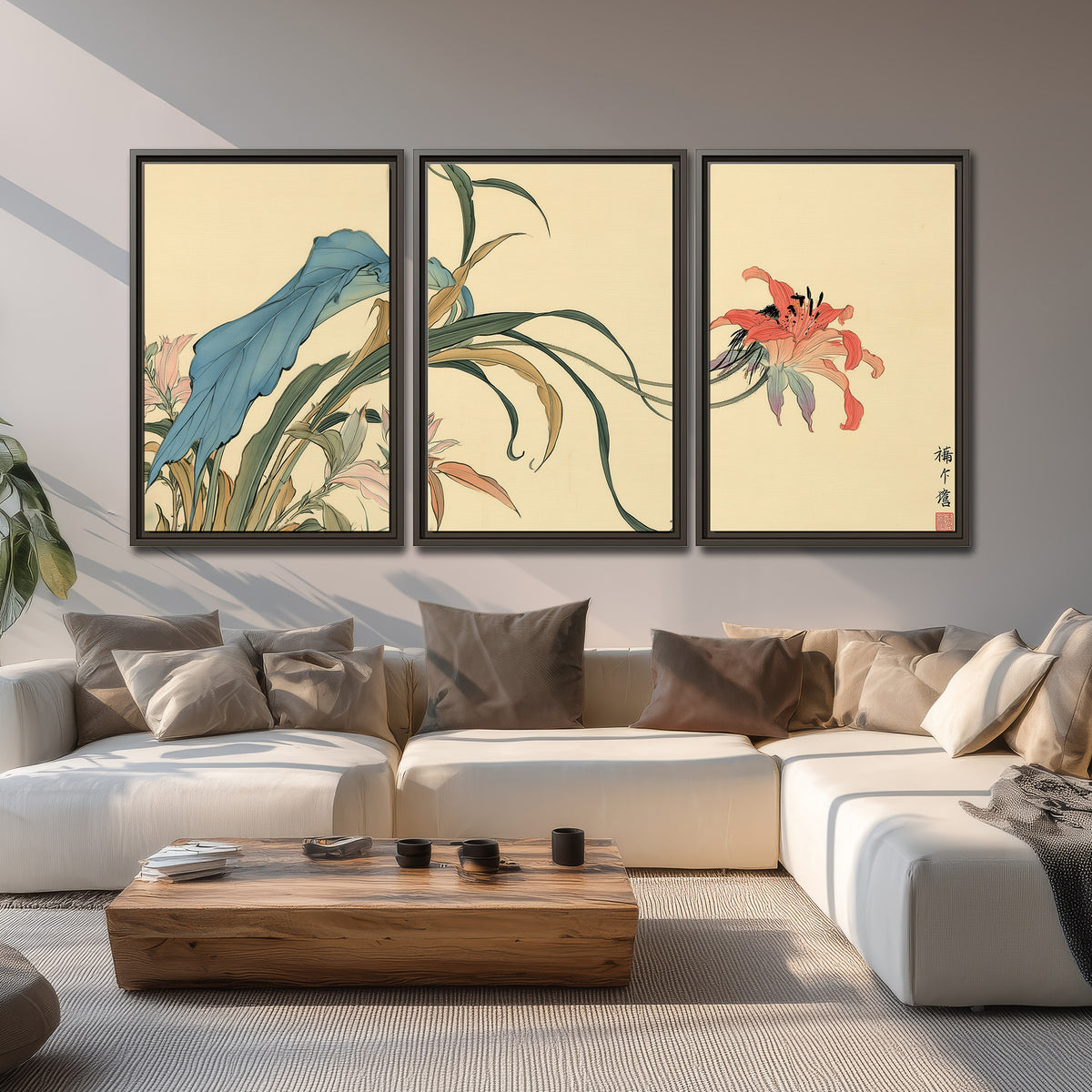 A delicate red flower and long blue-green leaves on a warm cream ground 3 piece framed canvas wall art displayed in a living room