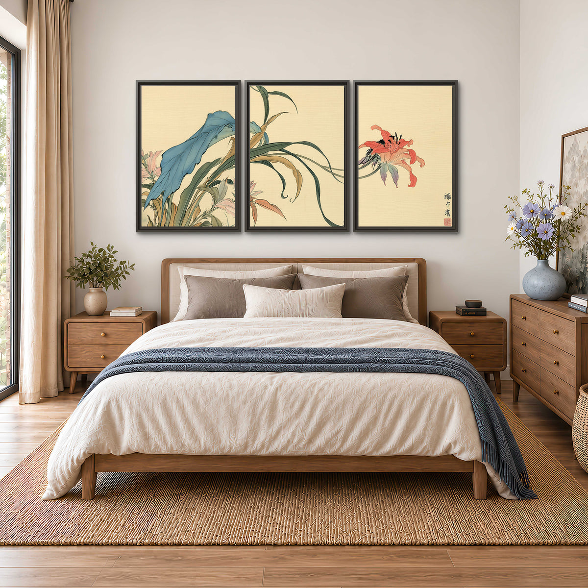 A delicate red flower and long blue-green leaves on a warm cream ground 3 piece framed canvas wall art styled in an interior