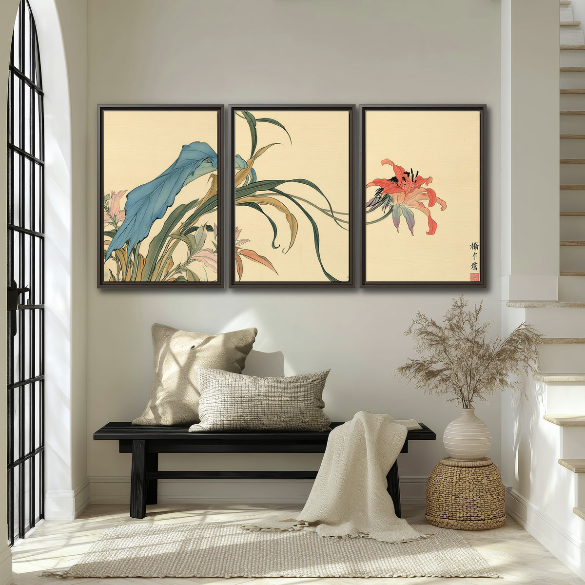 A delicate red flower and long blue-green leaves on a warm cream ground 3 piece framed canvas wall art displayed in a entryway