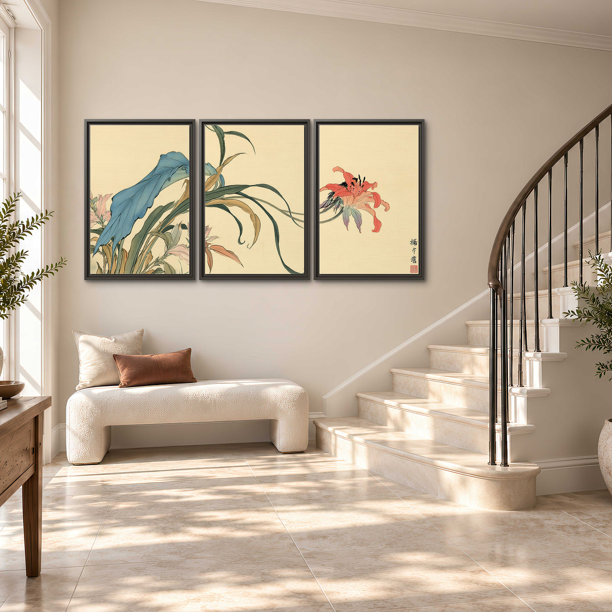 A delicate red flower and long blue-green leaves on a warm cream ground 3 piece framed canvas wall art styled in an interior