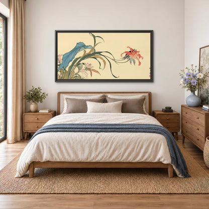 A delicate red flower and long blue-green leaves on a warm cream ground single framed canvas wall art styled in an interior
