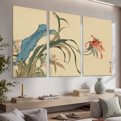 A delicate red flower and long blue-green leaves on a warm cream ground set of 3 poster prints displayed in a console