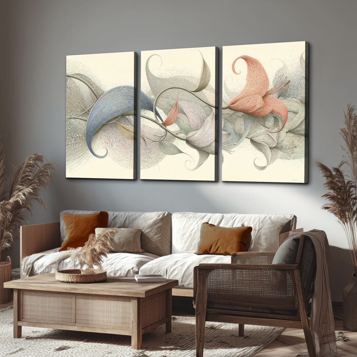 Soft gray, pink and green leaf-like forms joined by delicate flowing lines 3 piece canvas wall art displayed in a rustic living room