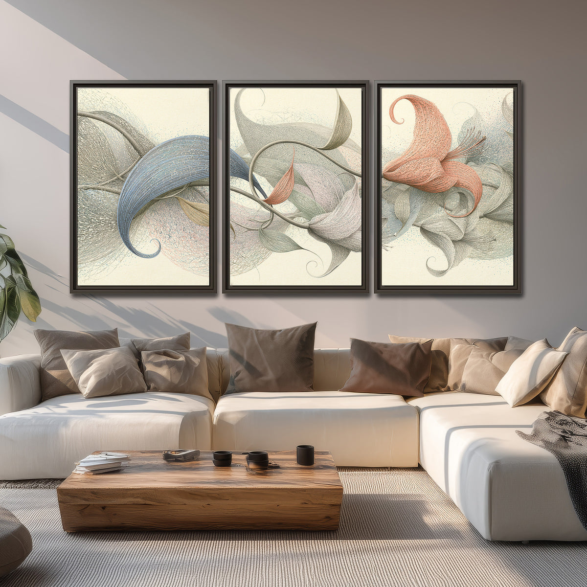 Soft gray, pink and green leaf-like forms joined by delicate flowing lines 3 piece framed canvas wall art displayed in a living room