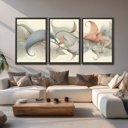Soft gray, pink and green leaf-like forms joined by delicate flowing lines 3 piece framed canvas wall art displayed in a living room