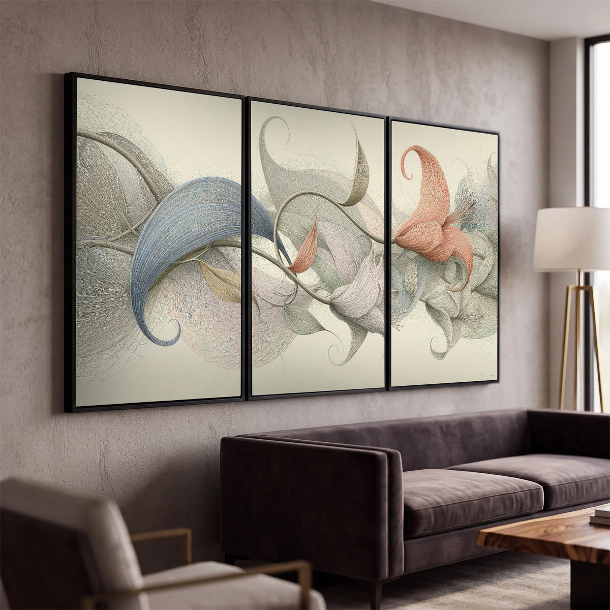 Soft gray, pink and green leaf-like forms joined by delicate flowing lines 3 piece framed canvas wall art displayed in a modern living room